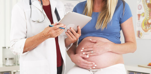 беременная девушка у врача